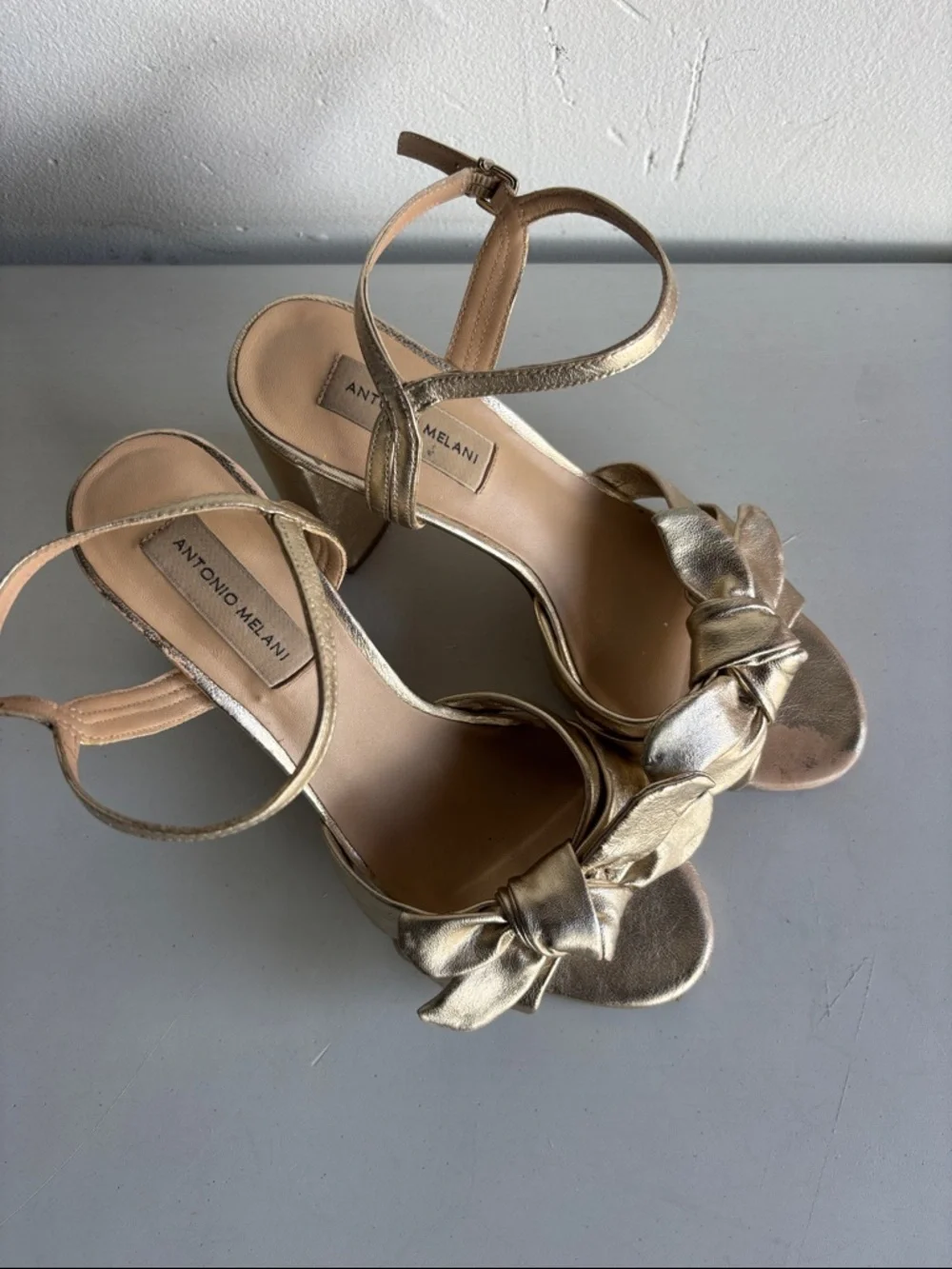 ANTONIO MELANI elegant gold